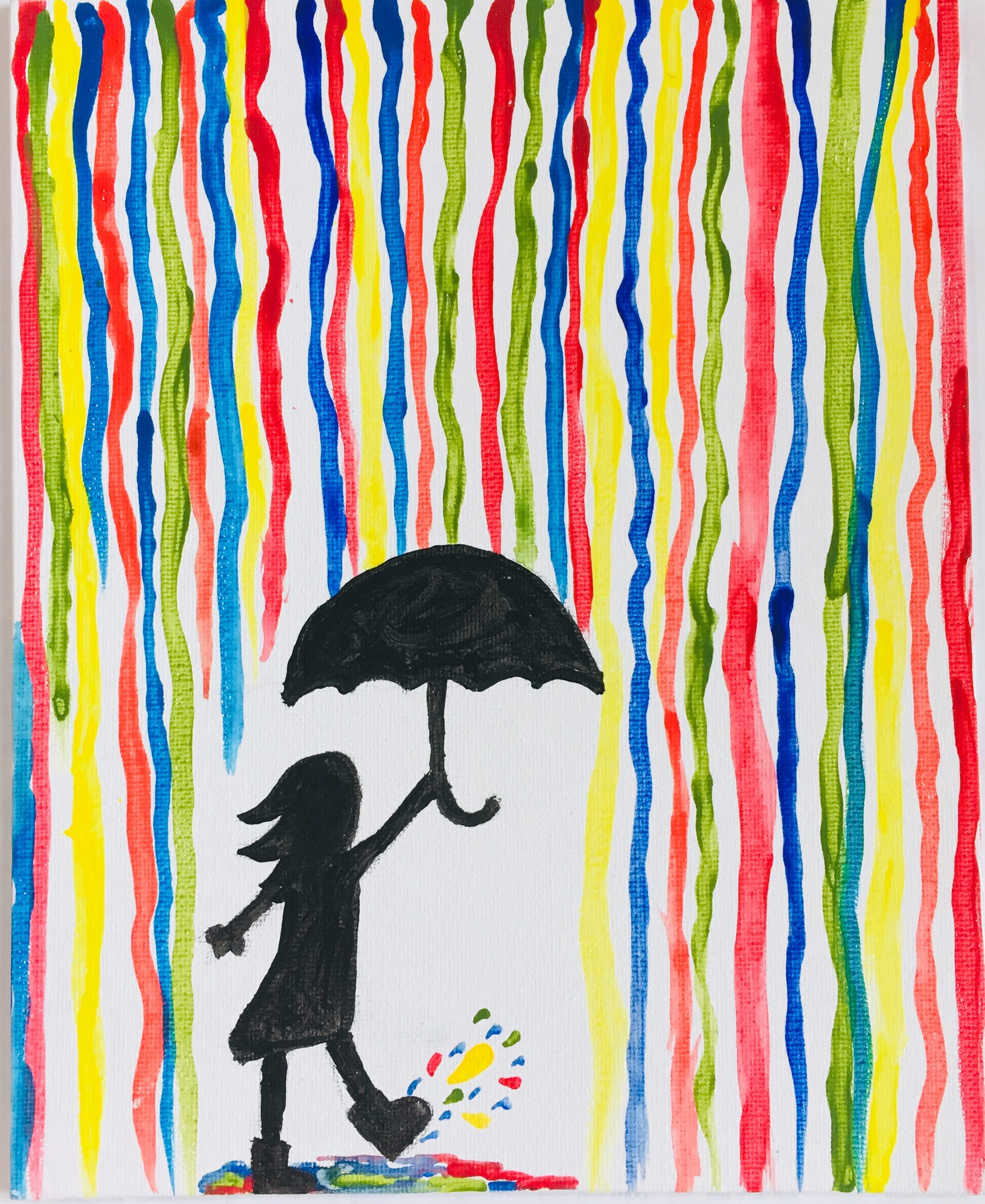 girl walking with umbrella in a colorful rain